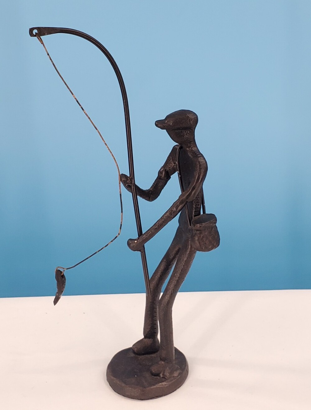 Vintage bronze mcm man fishing sculpture